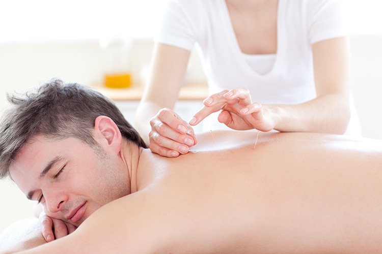 Heights Acupuncture & Wellness Clinic Treatment on Man